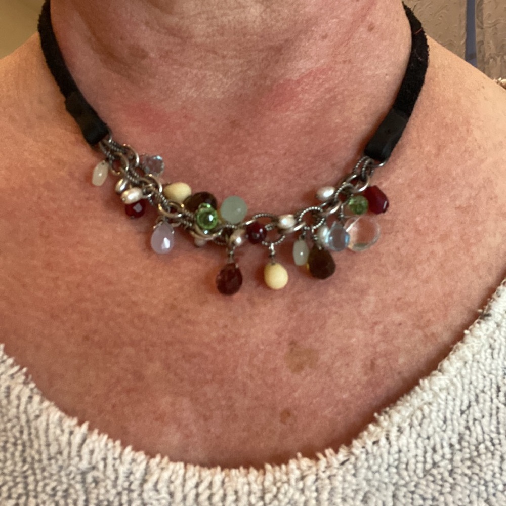 Silpada leather choker with multi-color beads/gems.